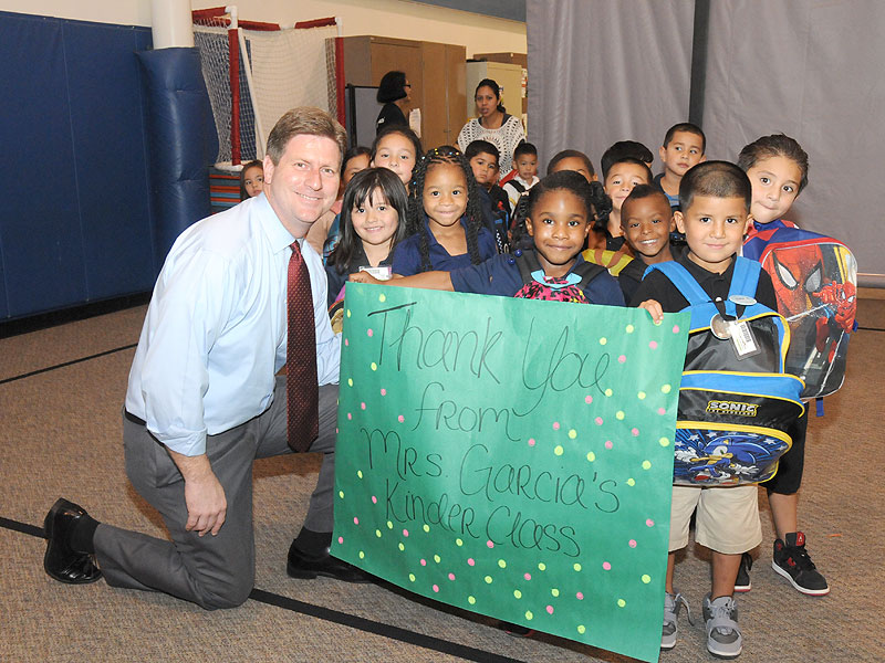 Mayors in 55 Cities Fill Backpacks with Food for Hungry Children