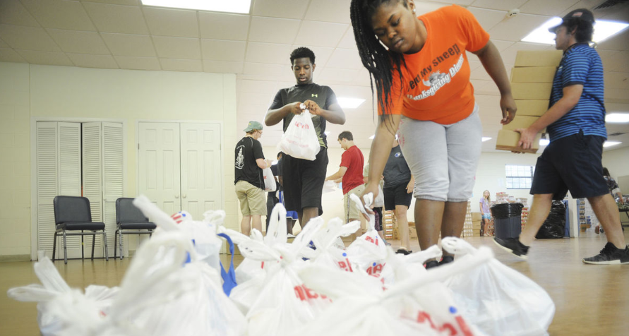 Gathering Place interns pack blessings in backpacks