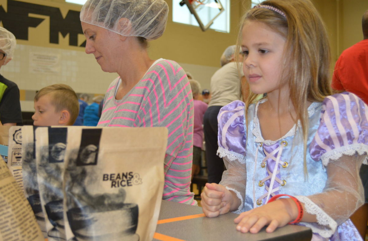 Feeding Frederick: Volunteers pack 10,000 meals for FCPS students in need