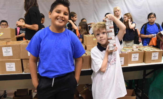 All Nevitt Students Receive Food Items, Books at Blessings in a Backpack Event