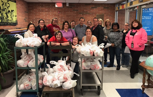 Teachers spent their unexpected day off delivering food to kids in need