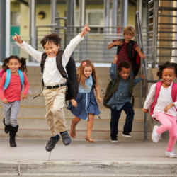 Picture of happy kids running and jumping