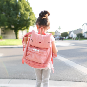 Little girl with Hello Kitty backpack