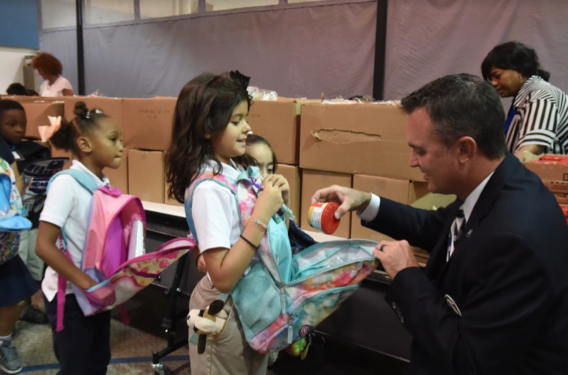 Nevitt Elementary Students Take Home Food and Books on Blessings Day