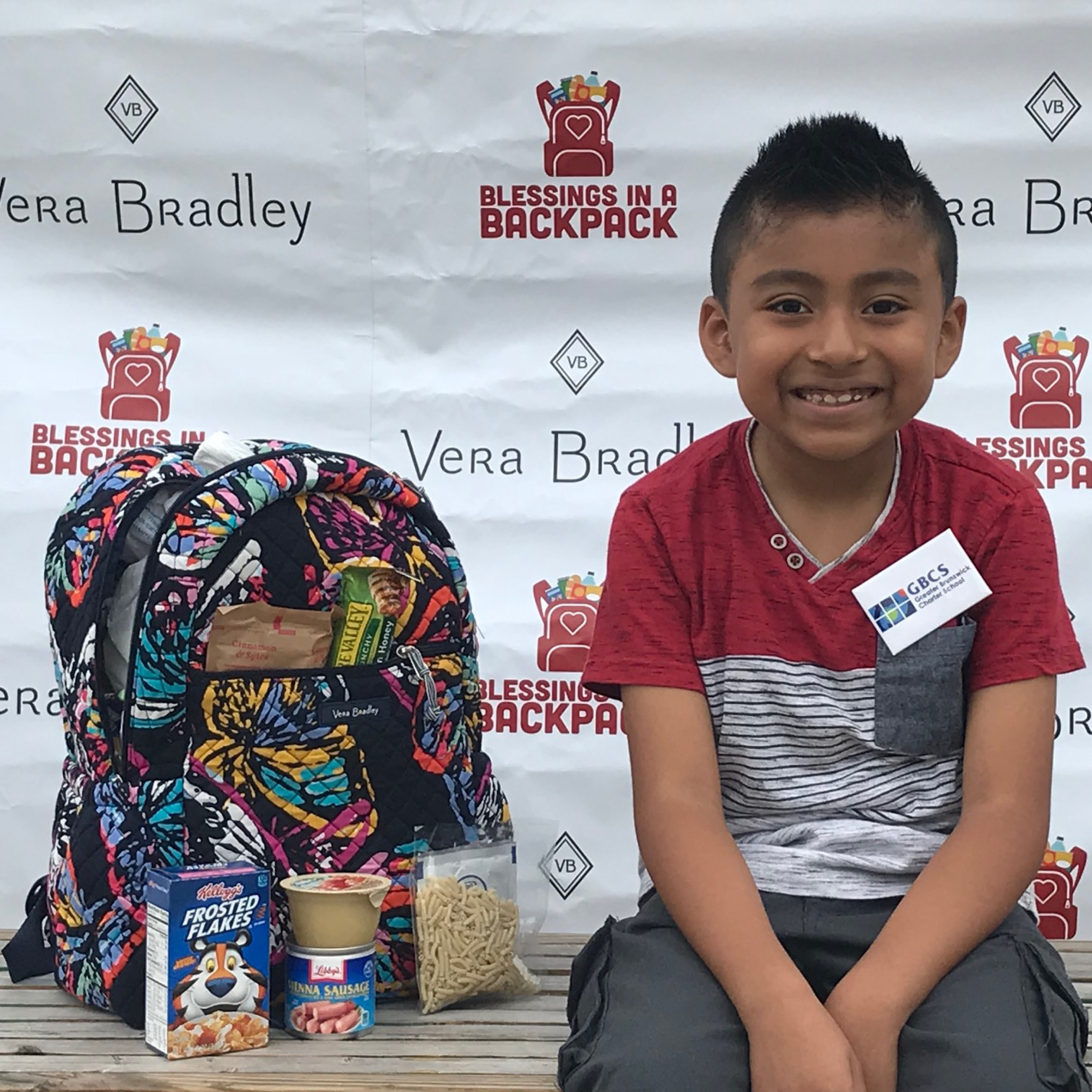 Boy with Vera Bradley backpack