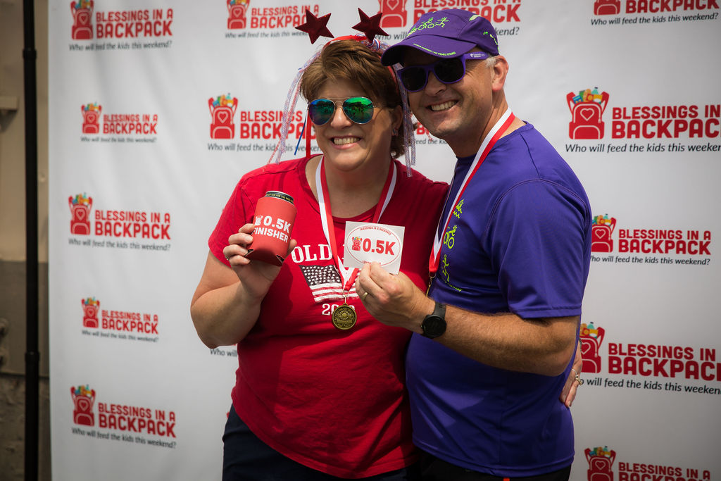 Couple posing at 0.5K race in Louisville