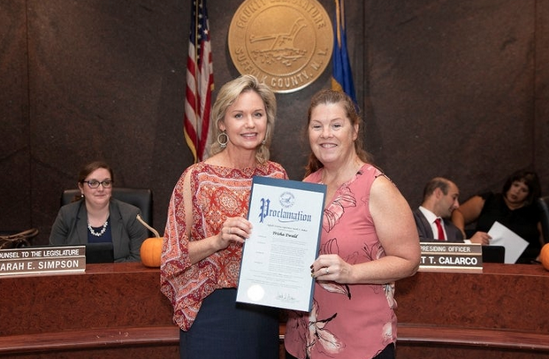 Legislator Anker Honors Blessings in a Backpack’s Trisha Ewald