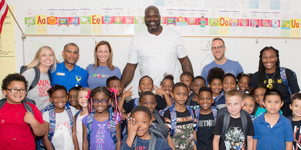 Shaq Packs Blessings in a Backpack