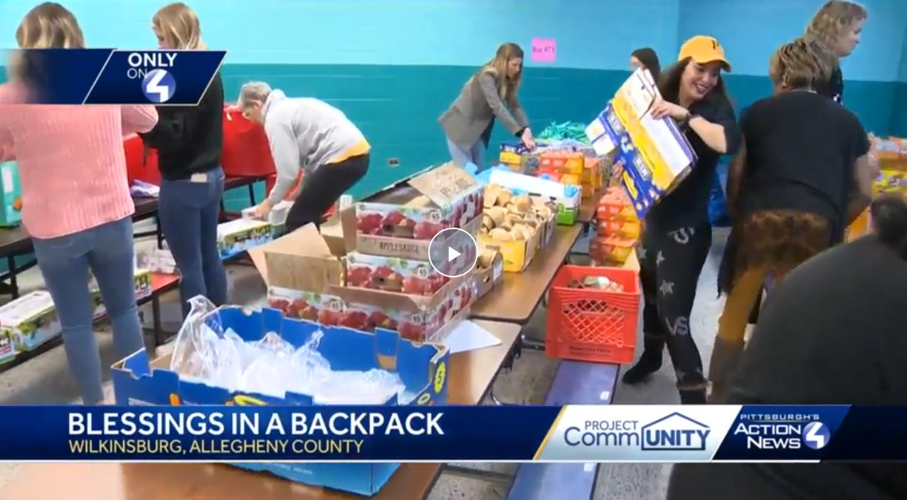 Wives, girlfriends of Pittsburgh Penguins help pack food for children