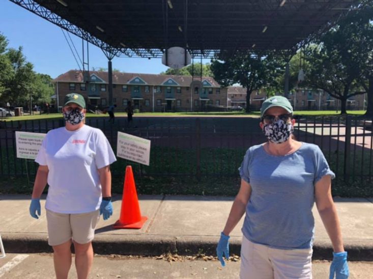 volunteers in houston wear vera bradley masks