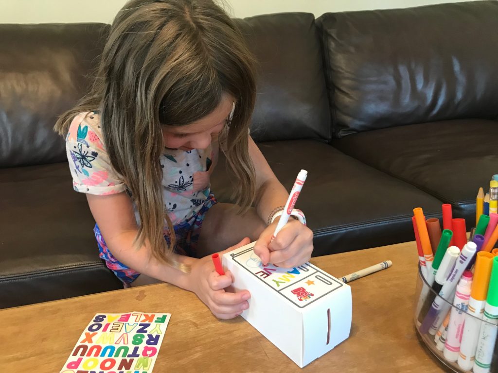kid with piggy bank