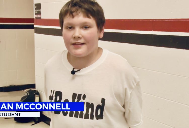 Middle school student’s T-shirt leads to a big donation for a school program that helps the hungry