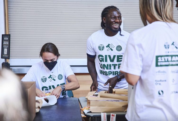 Portland Timbers and Thorns Players Volunteer With Blessings in a Backpack