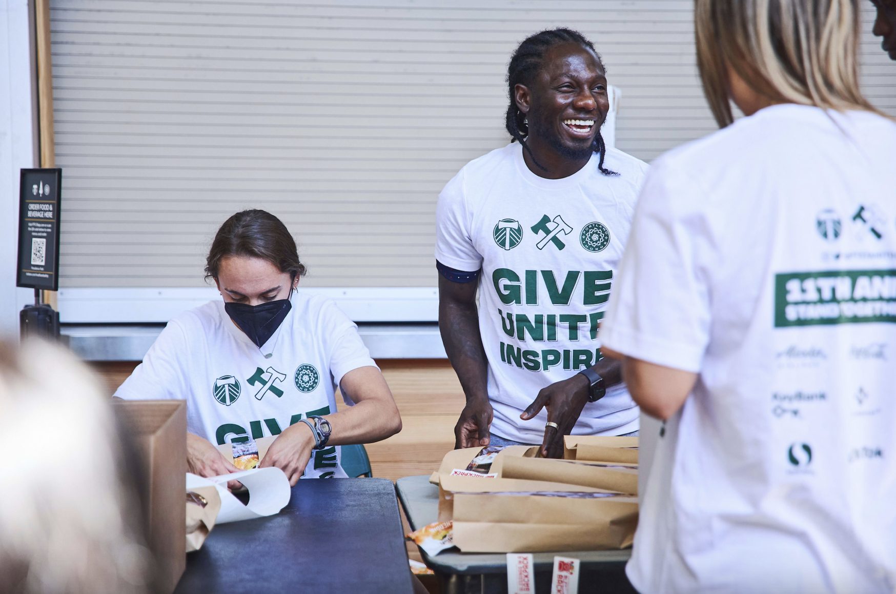 Portland Timbers and Thorns Players Volunteer With Blessings in a Backpack