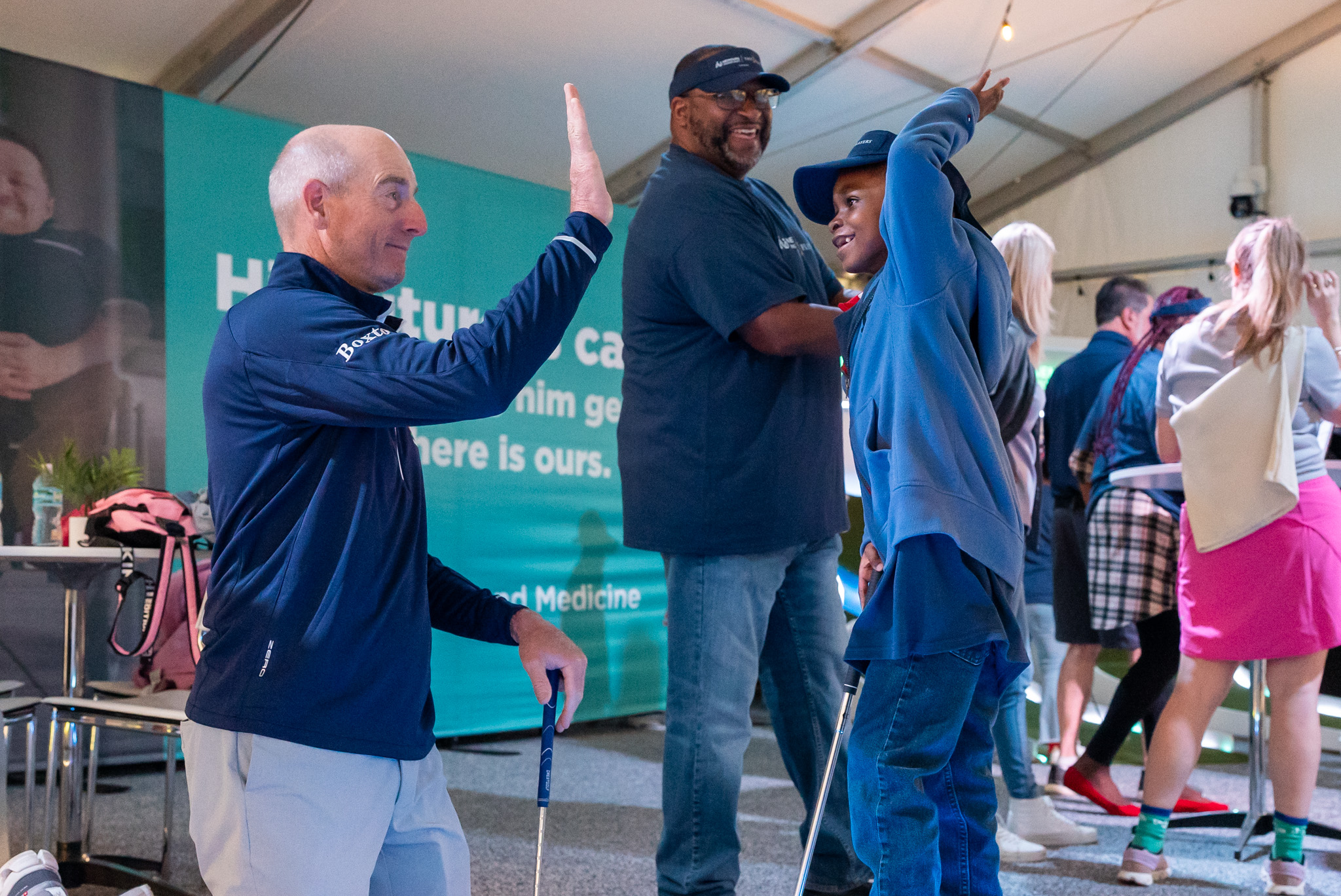 Nemours, Blessings in a Backpack, and Fuyrk volunteers pack food for kids