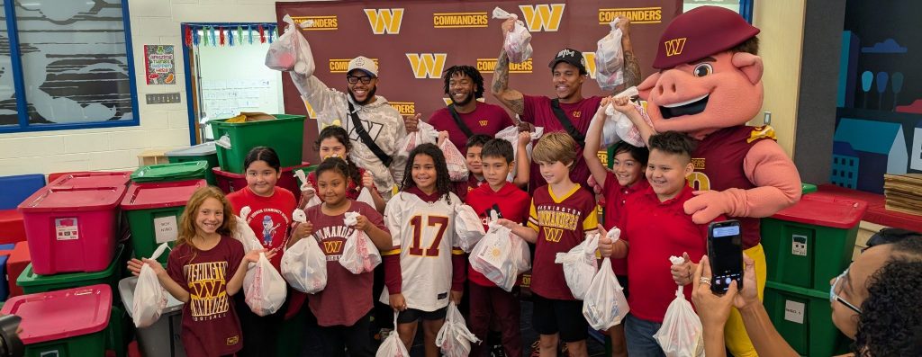 Washington Commanders players visit Alexandria school, distribute $5,000 in food, supplies